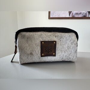 STS Ranchwear hair on hide makeup and brush organizer / pouch.